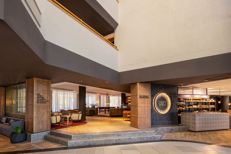 The Safari Court Hotel & Conference Centre (or Adjacent Safari Hotels)